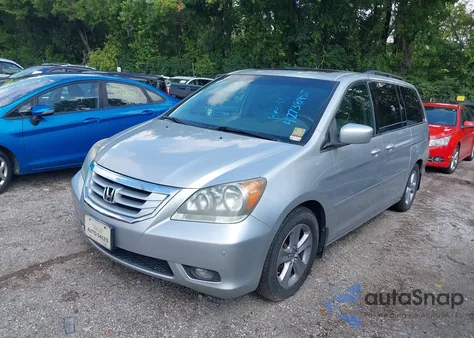 2010 Honda Odyssey Touring from USA, damaged, VIN 5FNRL3H92AB078107